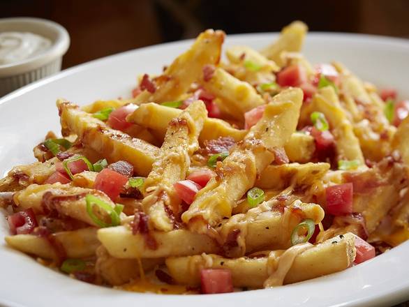 Order Loaded Fries food online from Smokey Bones Barbeque and Grill store, Pittsburgh on bringmethat.com