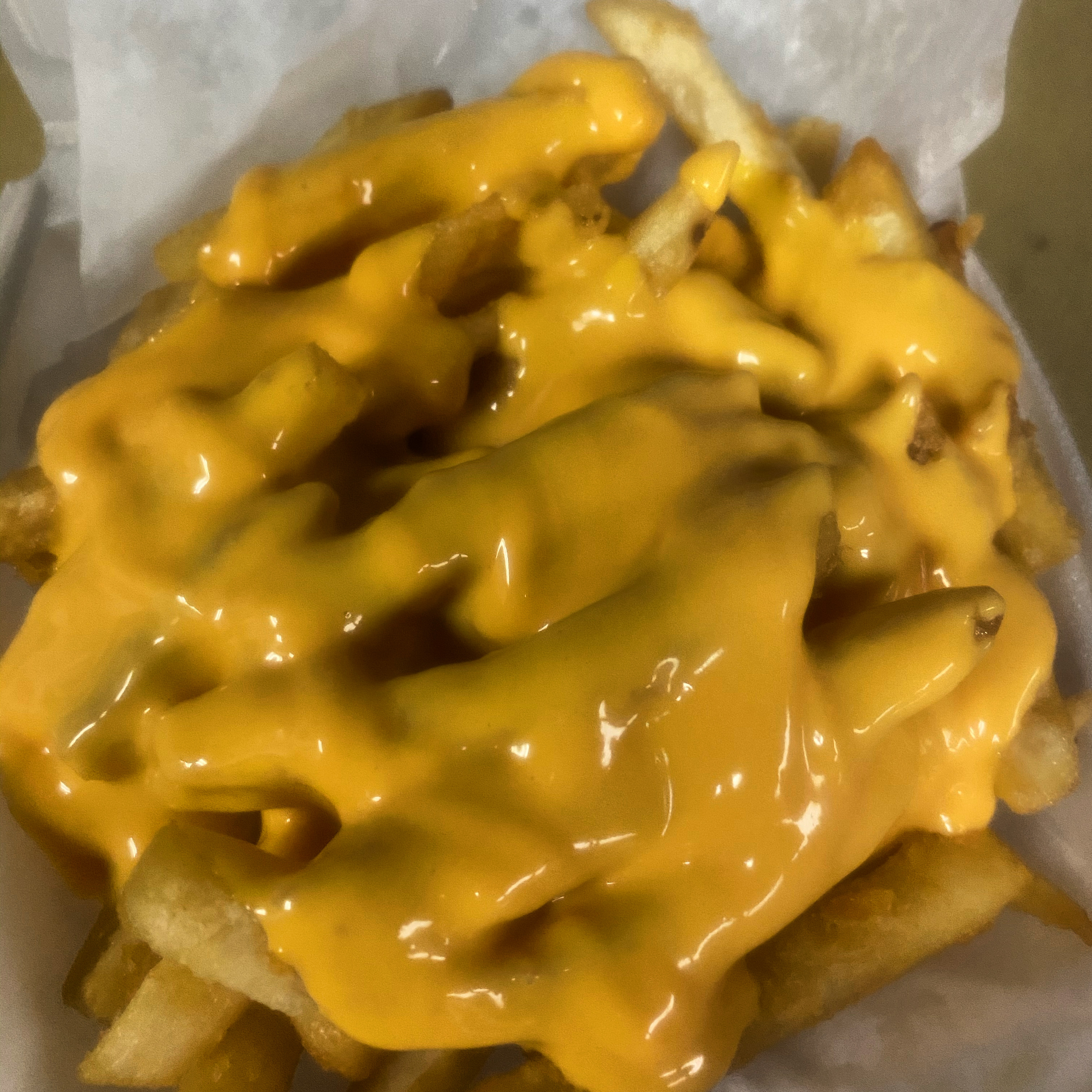 Order Cheese Fries food online from Flava Wingz Spot store, Irvington on bringmethat.com