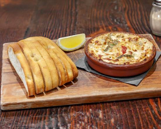 Order Famous Spicy Artichoke Dip food online from Patxi's Pizza store, Englewood on bringmethat.com