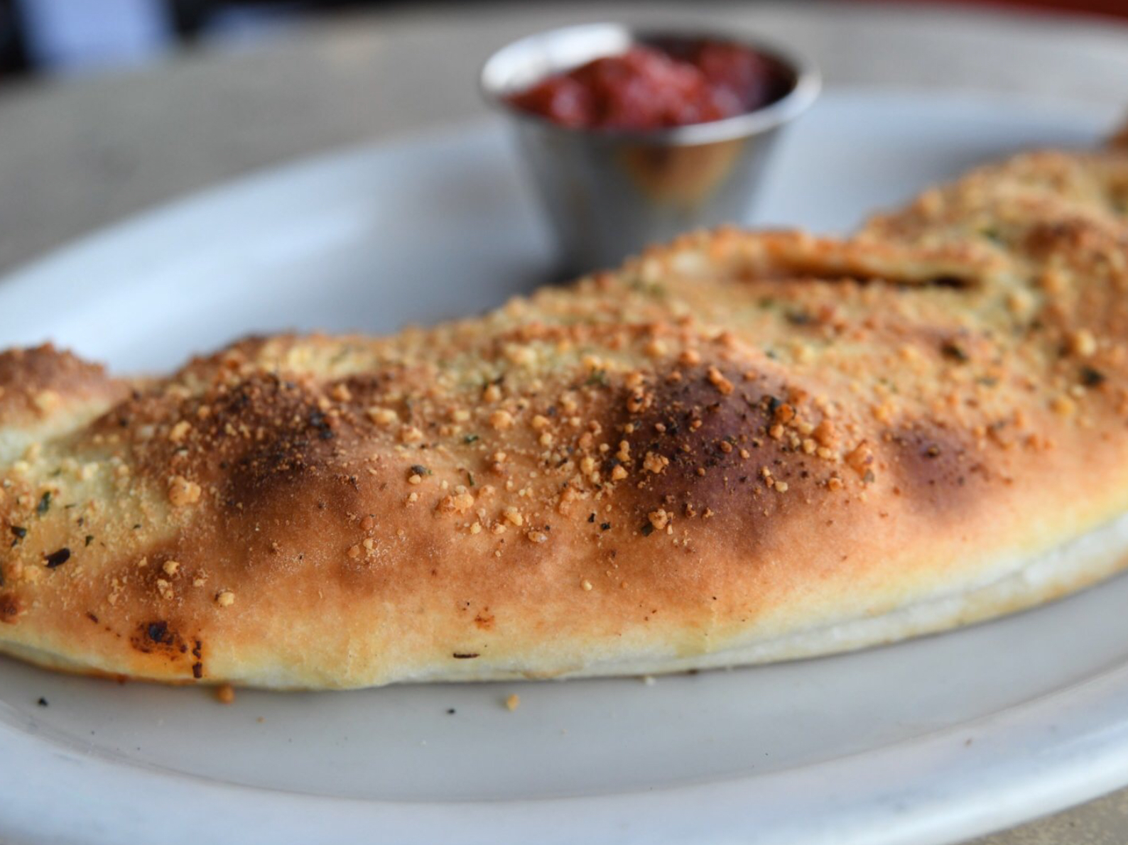 Order Meatball and Sausage Calzone food online from Milano’s Pizzeria store, Mesa on bringmethat.com