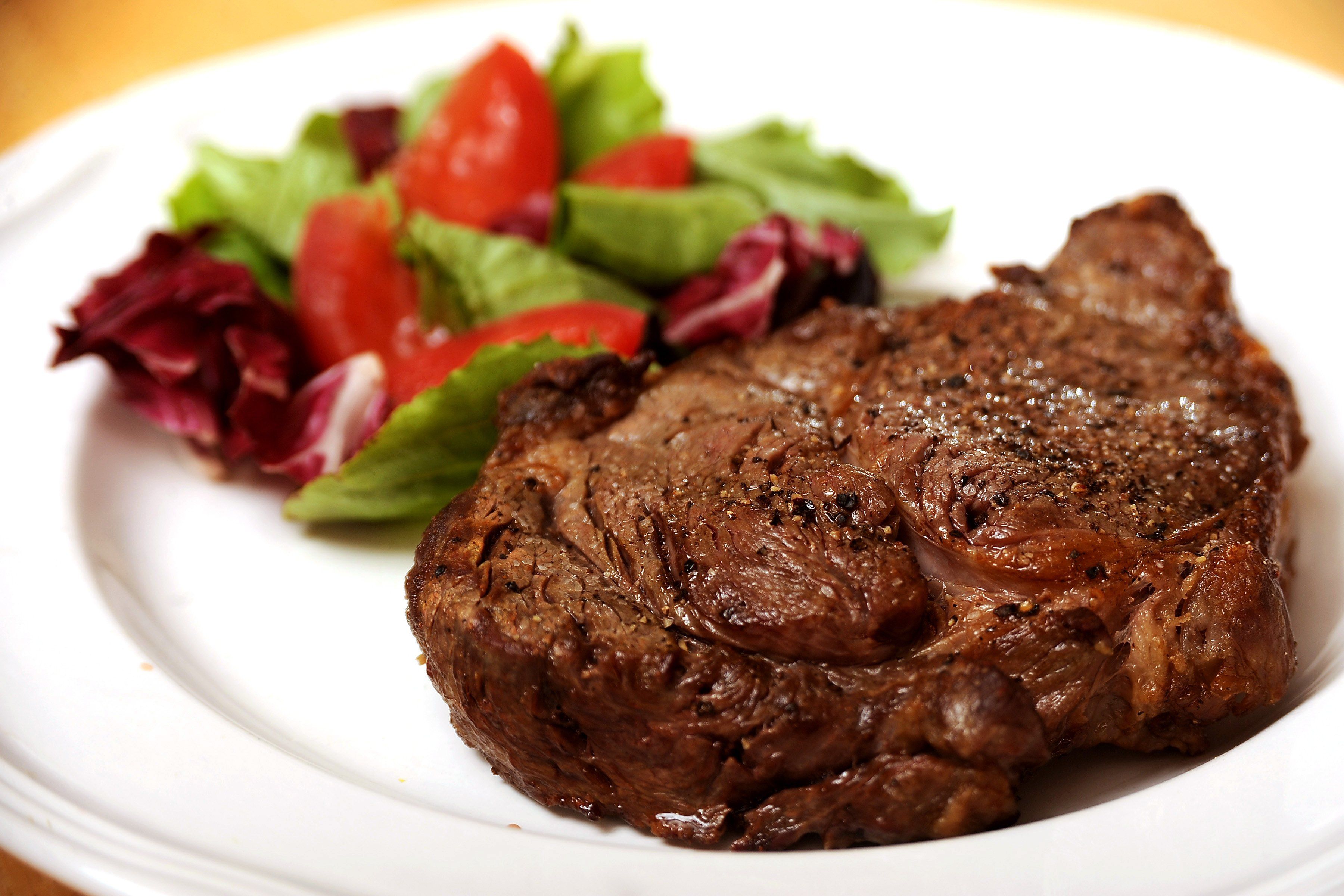 Order Broiled Rib Eye Steak food online from Sutton cafe store, New York on bringmethat.com