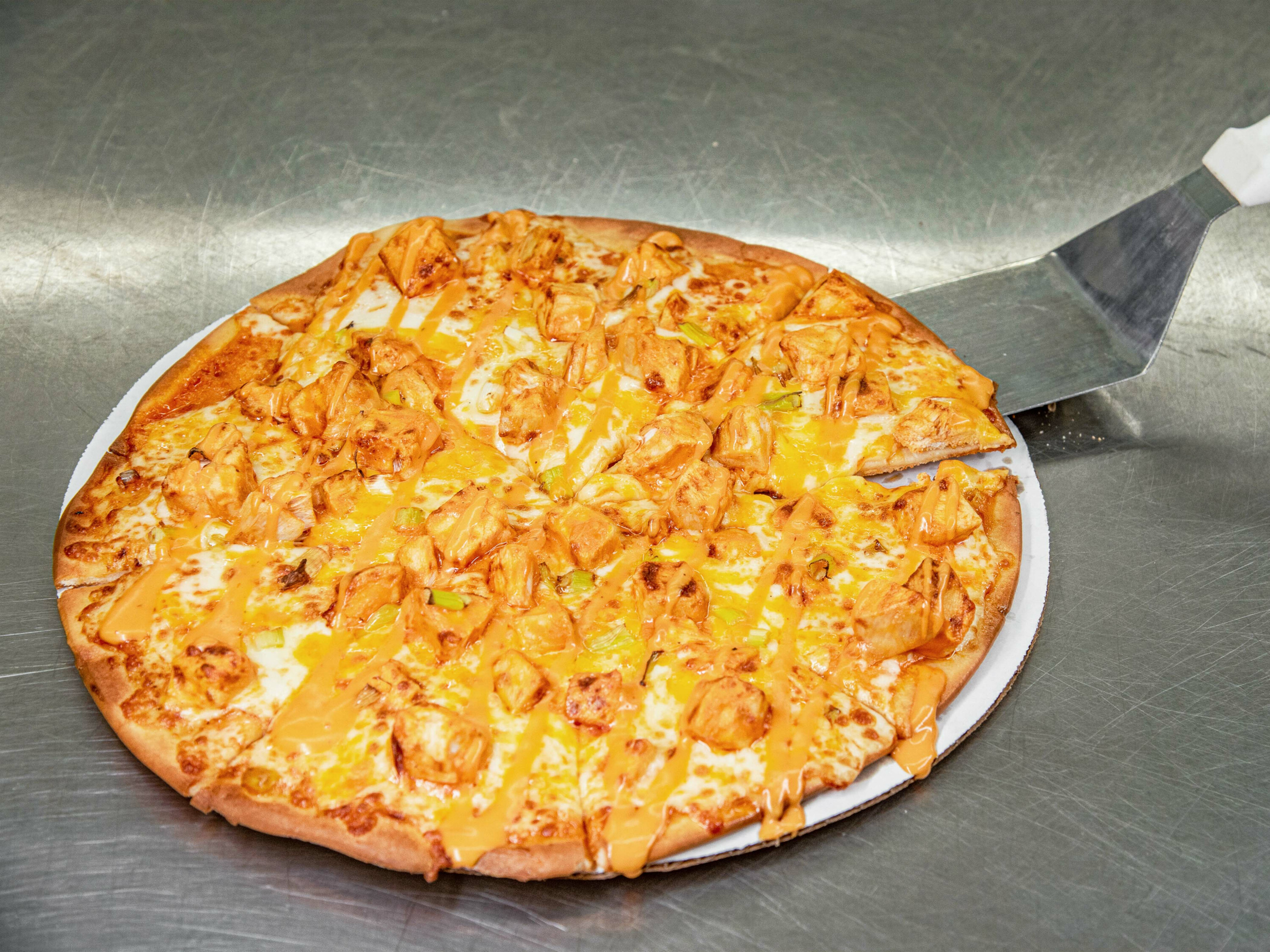 Order Buffalo Ranch Chicken Pizza food online from Around The World Gourmet store, Bellaire on bringmethat.com