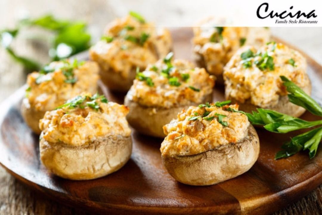 Order Stuffed Mushrooms - Half (Serves 1 Person) food online from Cucina Family Style Restorante store, East Quogue on bringmethat.com