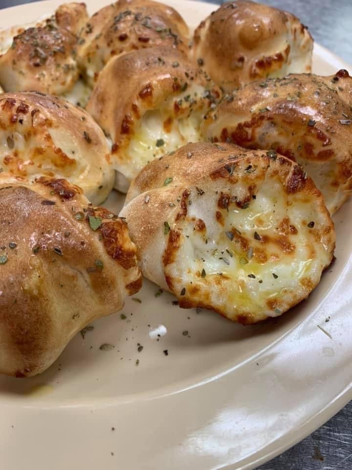 Order Garlic Knots with Cheese - Appetizer food online from Italiano Of Kingsport store, Kingsport on bringmethat.com
