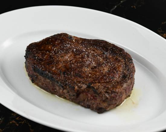 Order 16oz Ribeye food online from Simms Steakhouse store, Golden on bringmethat.com