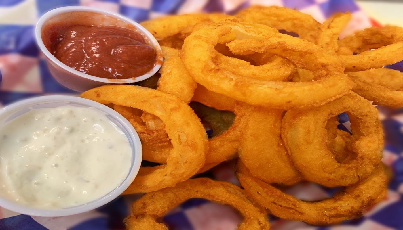 Order Onion Rings - Side food online from Village Pizza & Seafood store, Texas City on bringmethat.com