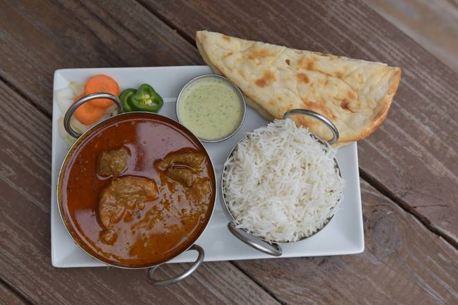 Order Lamb Vindaloo food online from Cowboys & Indians Tex-In Kitchen store, Houston on bringmethat.com