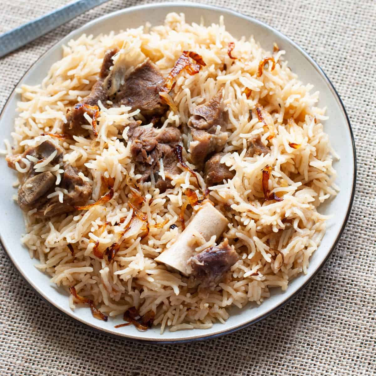 Order Goat Pulao food online from House Of Biryanis store, Sunnyvale on bringmethat.com