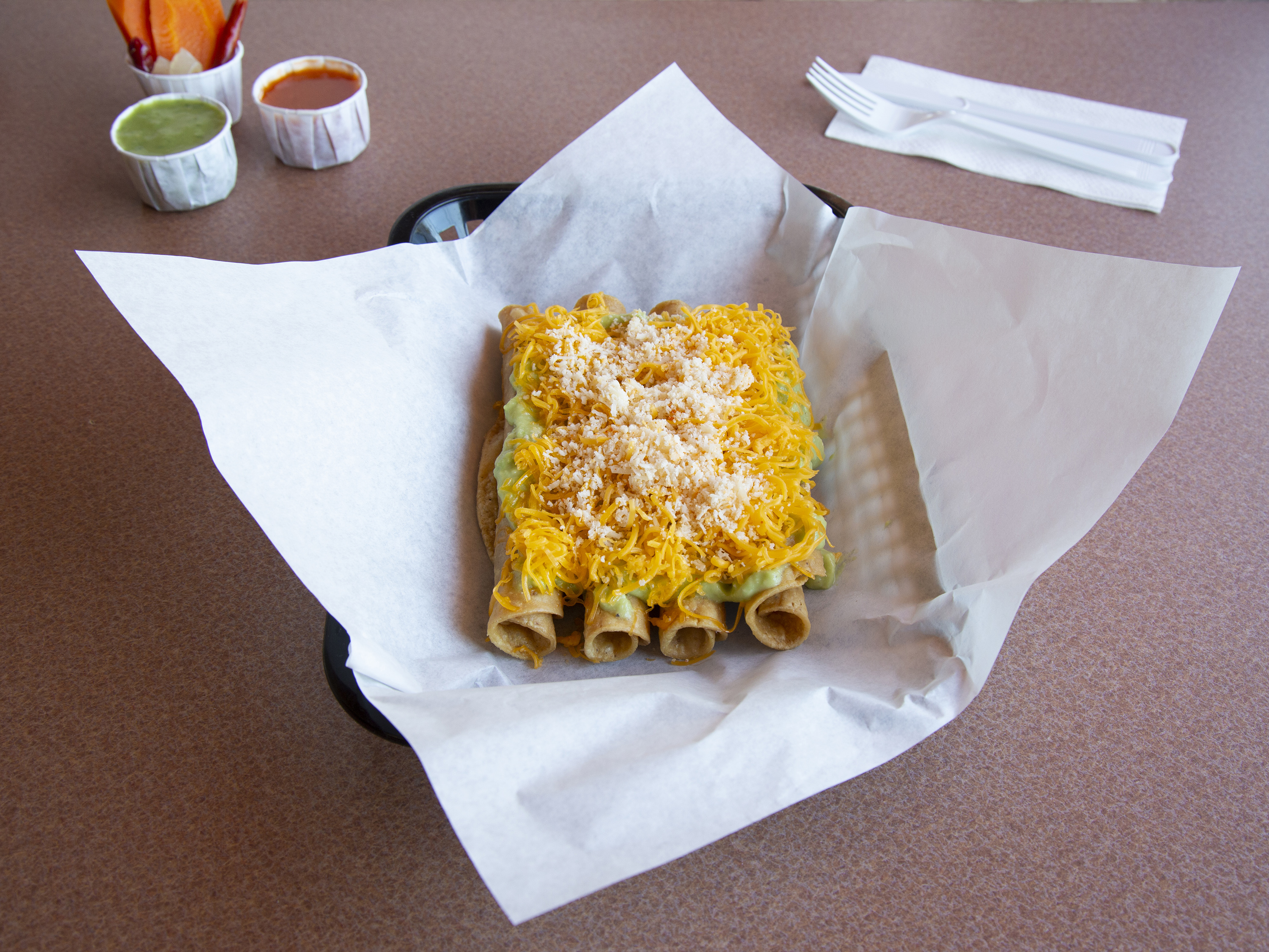 Order 4 Rolled Tacos Whit Cheese food online from Santanas Mexican Food store, El Cajon on bringmethat.com