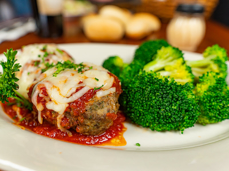 Order Lunch Nonna Tucci’s Meatballs Parmigiano (meat Sauce) food online from The Pasta House Co. store, Saint Louis on bringmethat.com