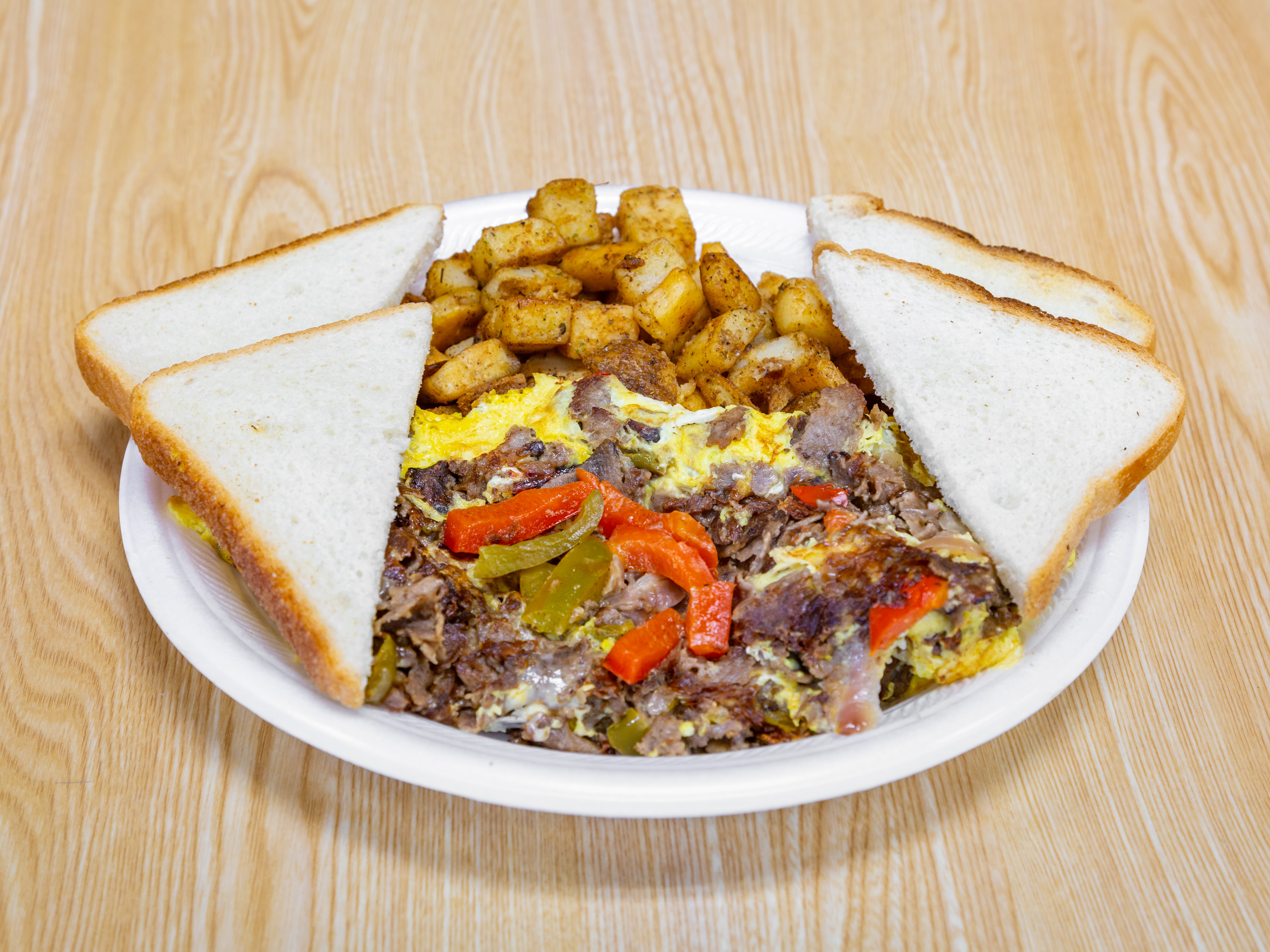 Order Steak, Peppers and Onions Omelette Sandwich food online from Bagel One store, East Brunswick on bringmethat.com