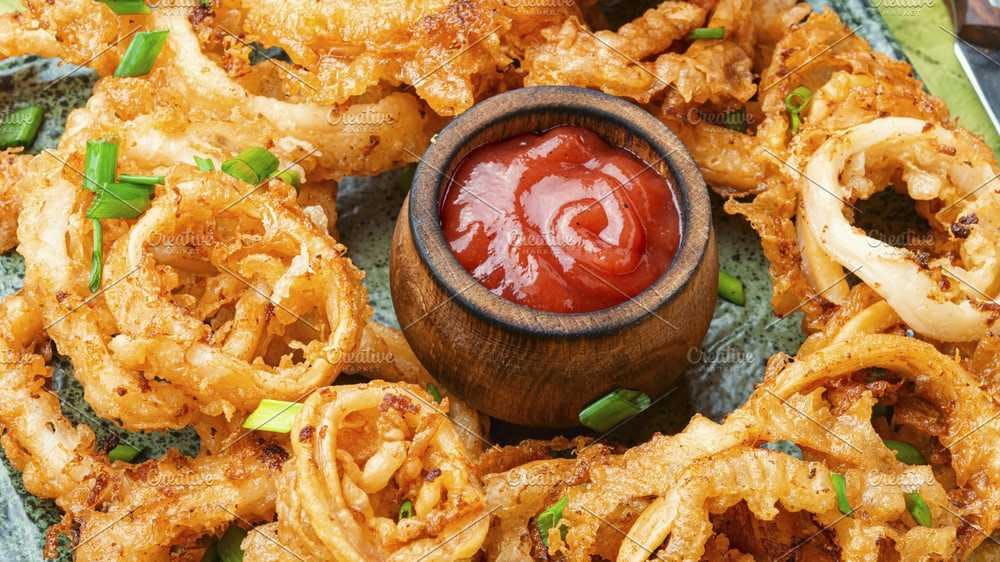 Order Squid Rings - 15 Pieces food online from Super Kennedy Chicken store, Bronx on bringmethat.com