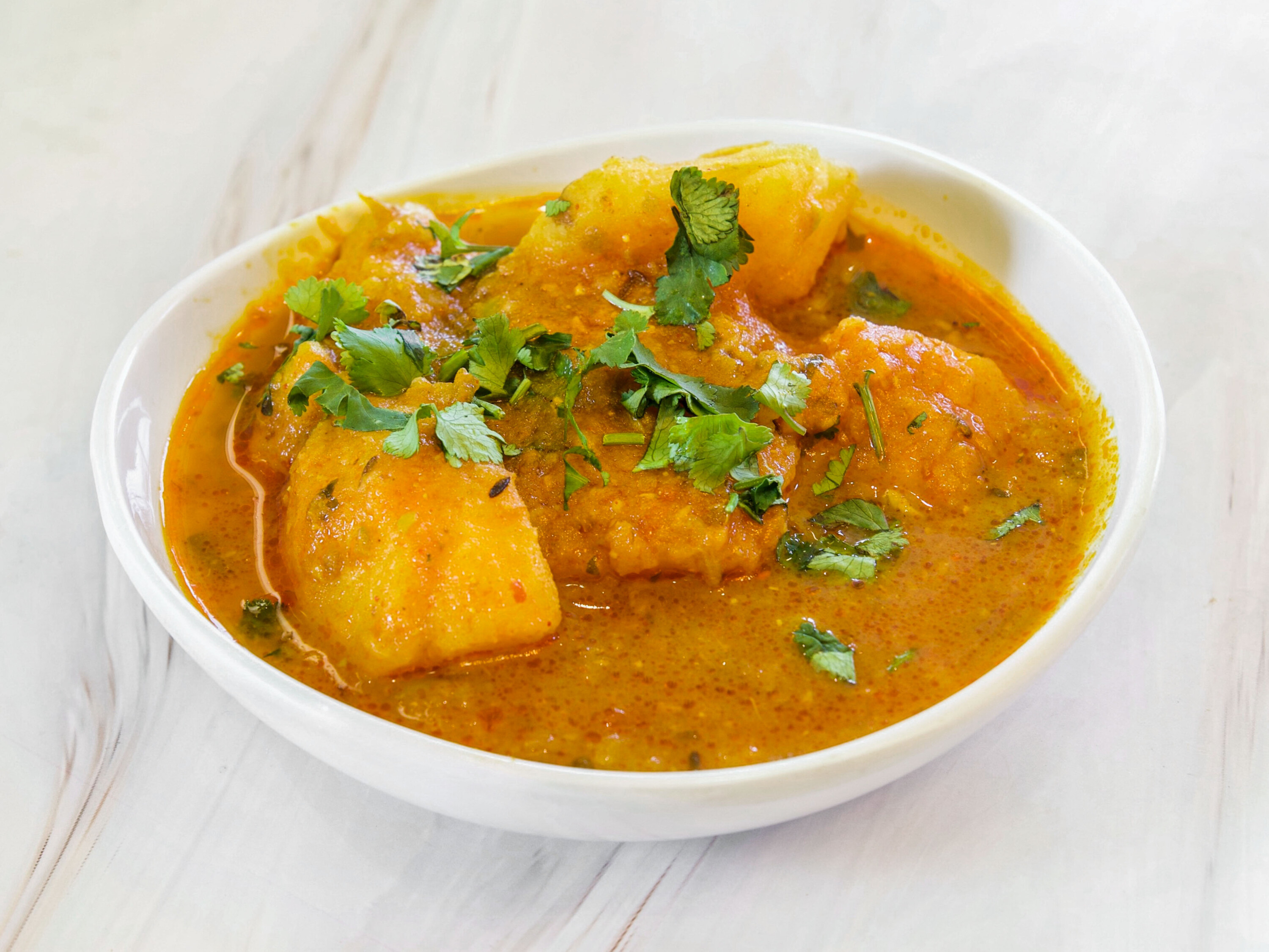 Order Veg. Aloo Curry of the Day food online from Rajwadi Thali Chaat & Sweets store, Fremont on bringmethat.com
