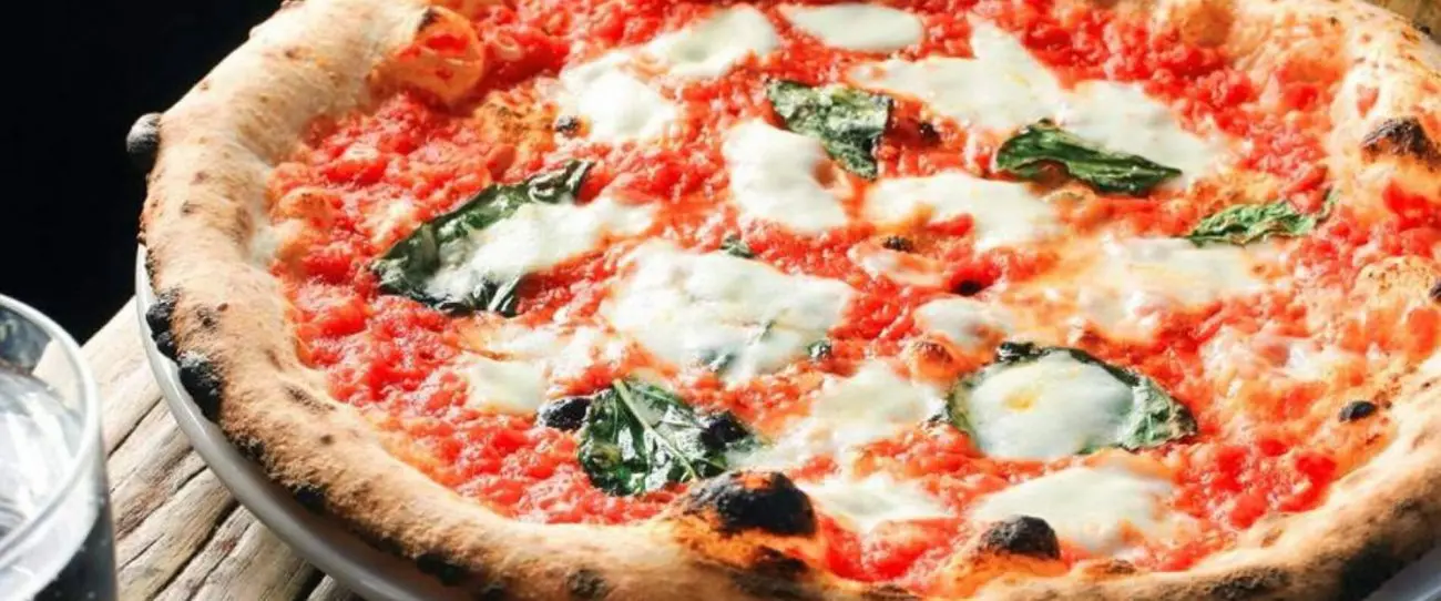Order Pizza Margherita food online from Capos Pizza store, San Antonio on bringmethat.com
