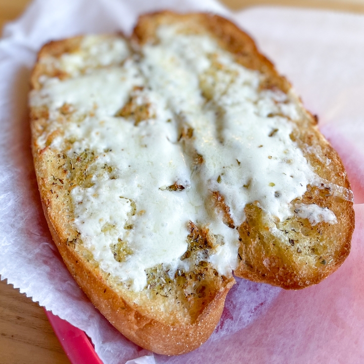 Order Garlic Bread & Cheese food online from Lost Dog Cafe store, Alexandria on bringmethat.com