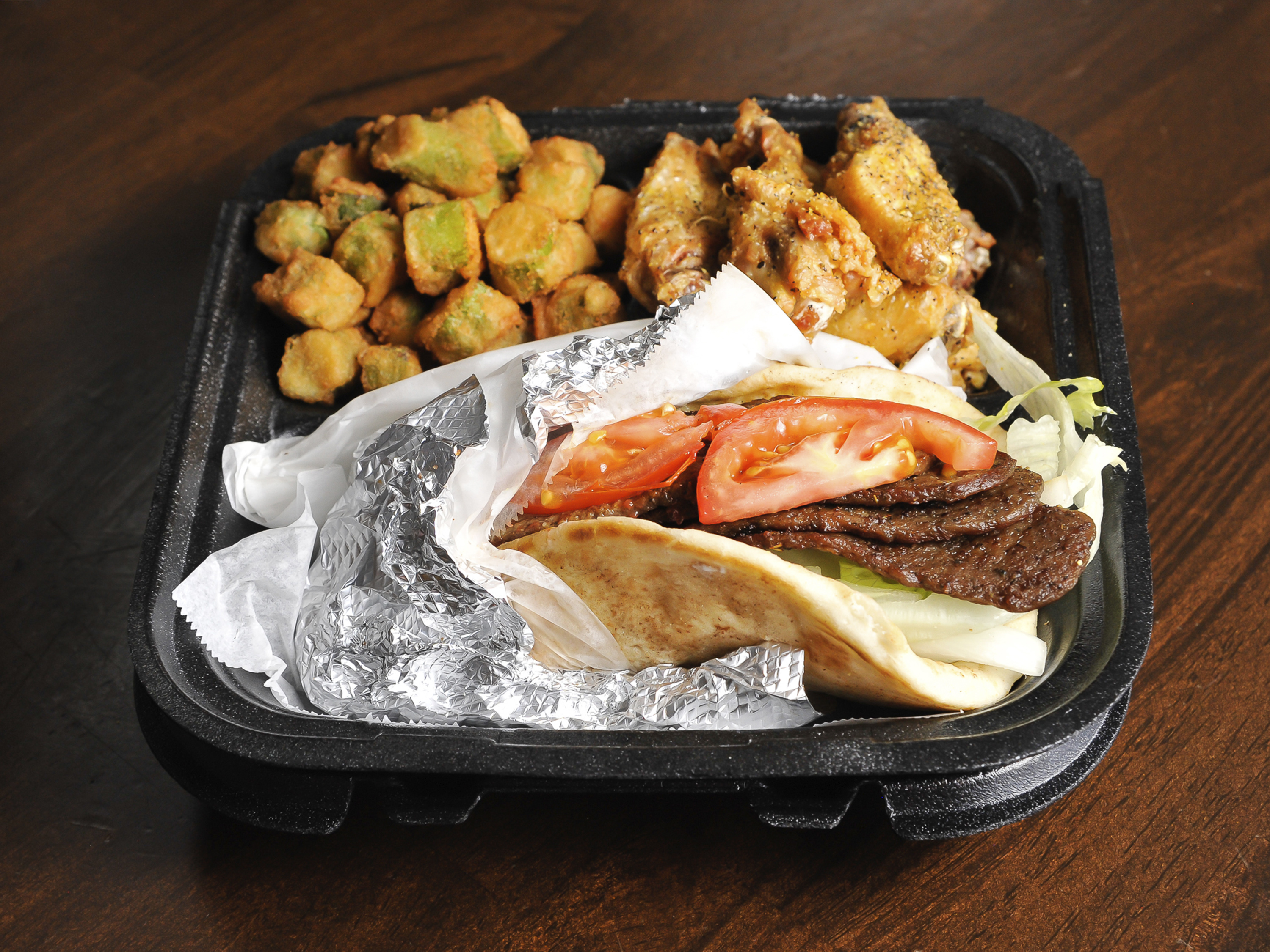 Order 8. Gyro Combo Special food online from Wing Cafe store, Covington on bringmethat.com