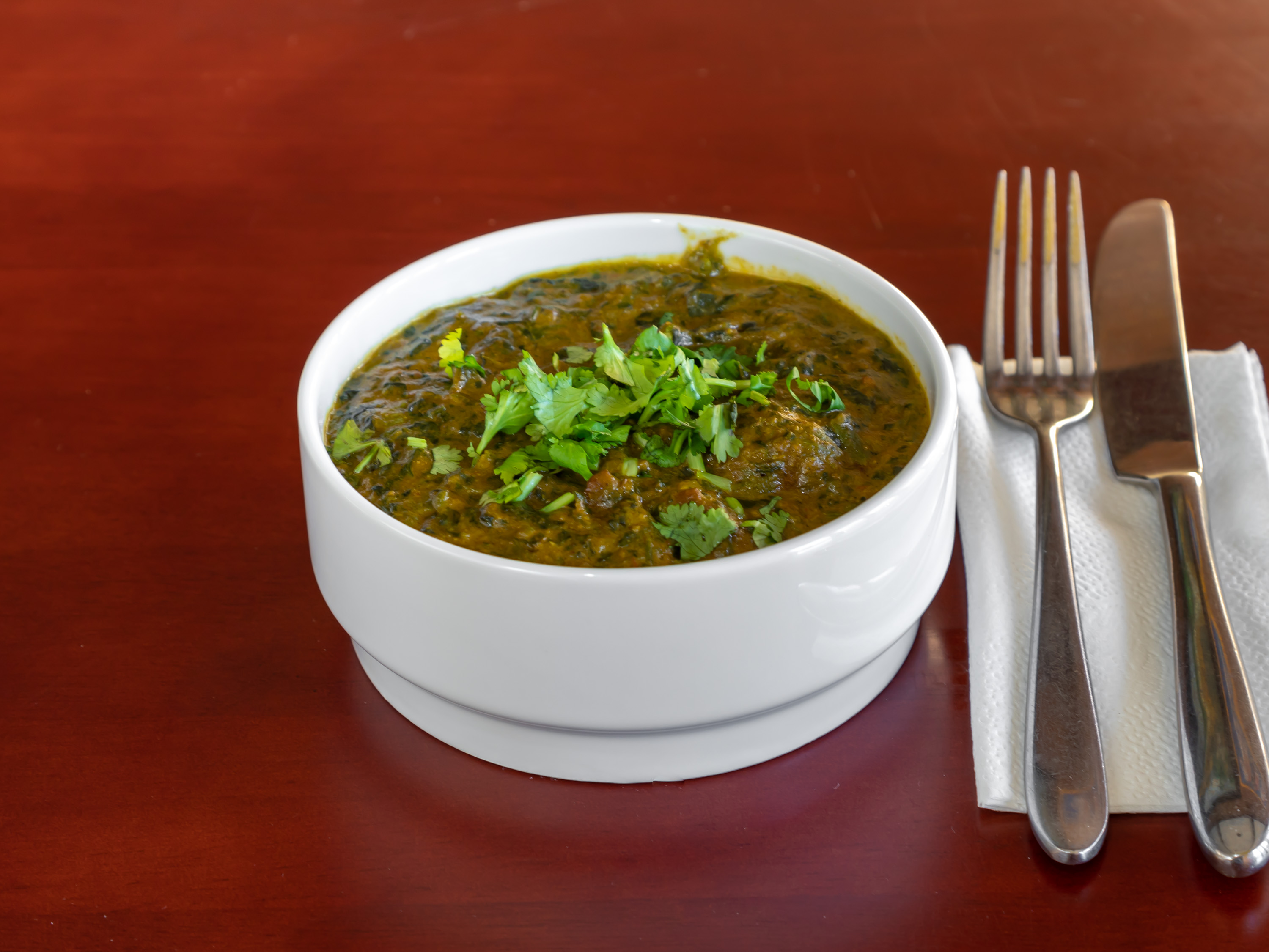 Order Lamb Saagwala food online from Sapphire Indian Restaurant store, Brooklyn on bringmethat.com