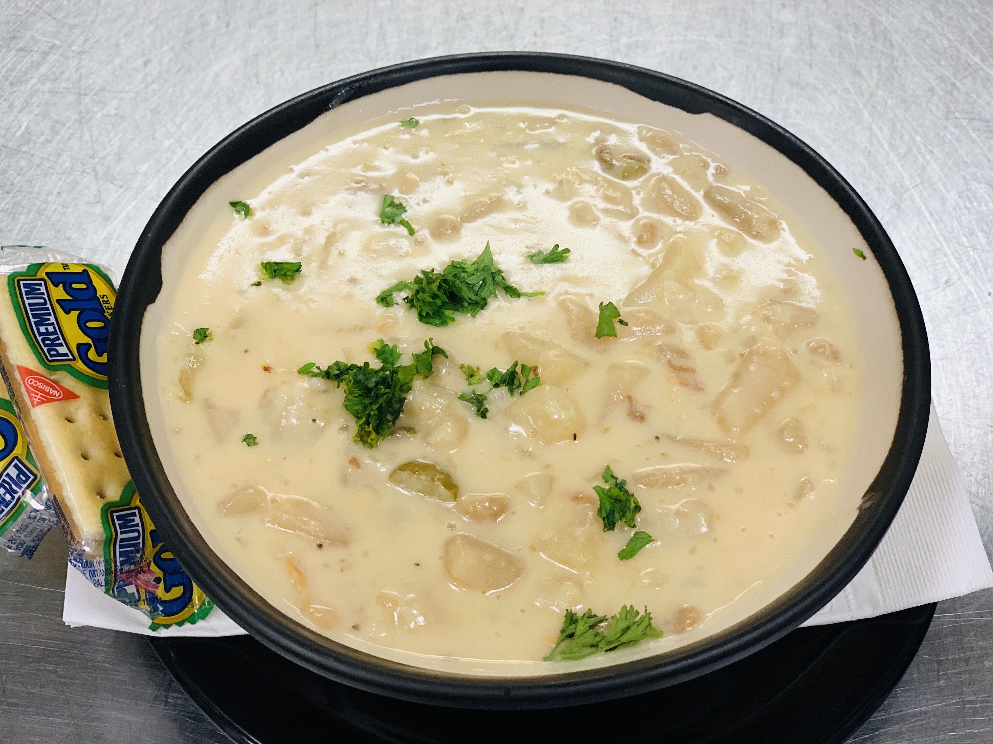 Order Clam Chowder Soup food online from Mojo Pub -N- Grill store, Youngstown on bringmethat.com
