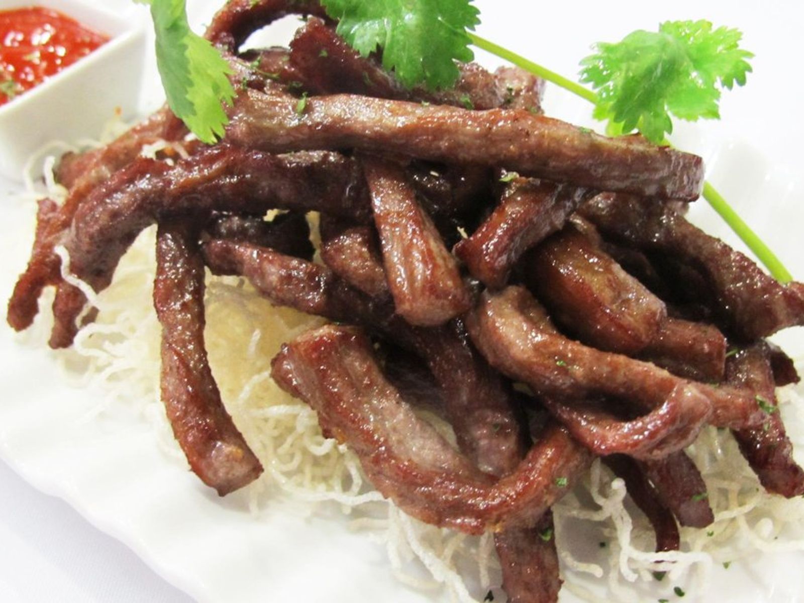 Order THAI BEEF JERKY (8 oz) food online from Pinto Urban Thai Diner store, Richardson on bringmethat.com