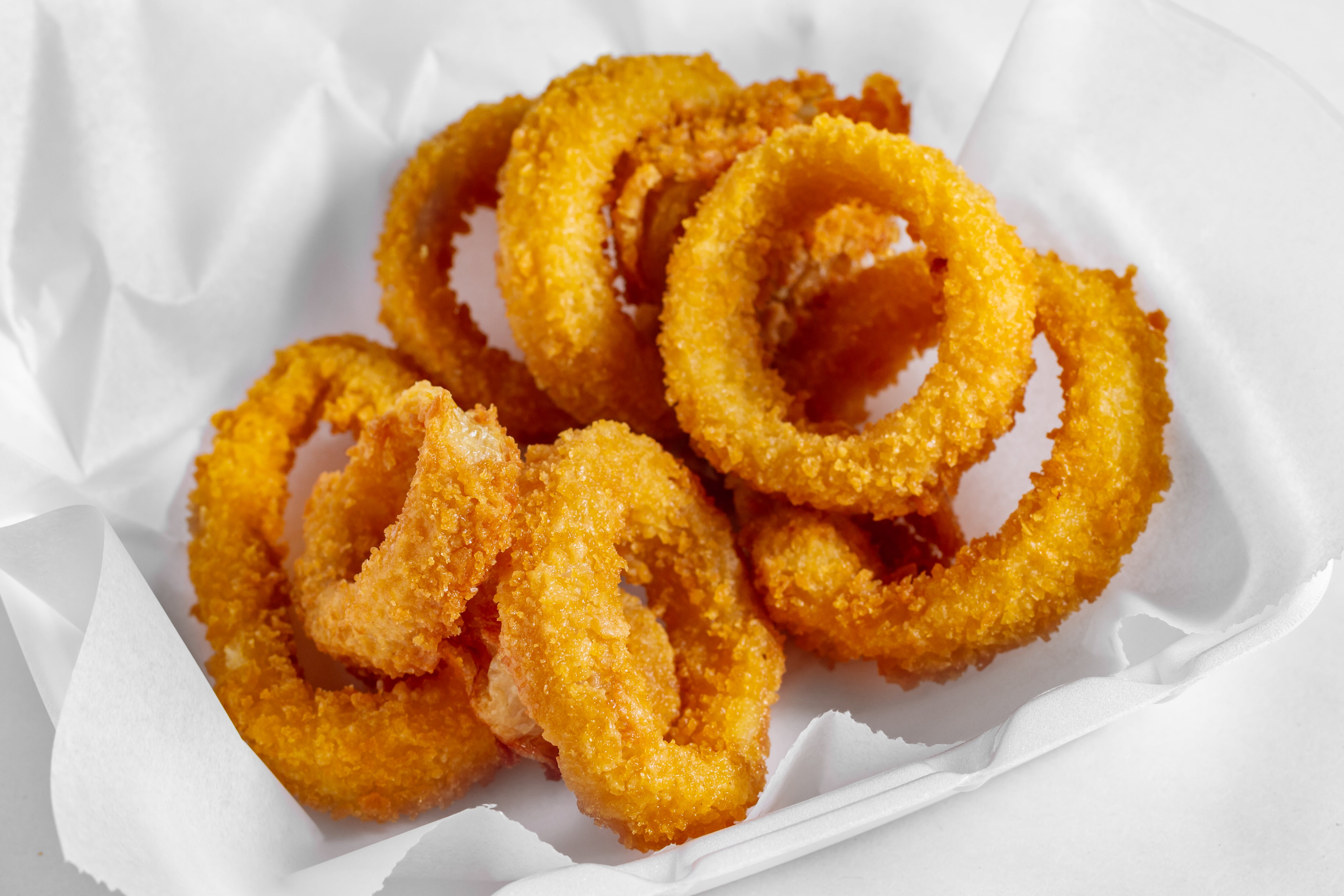 Order Onion Rings - Side food online from Wings Things N More store, Catonsville on bringmethat.com