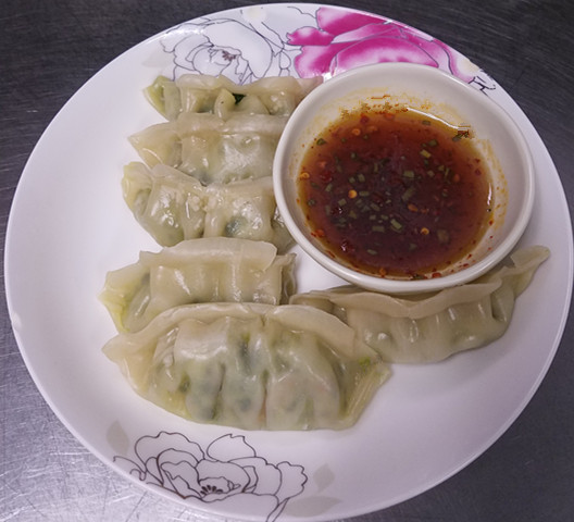 Order 16. Vegetable Dumplings food online from Szechuan House store, Ames on bringmethat.com