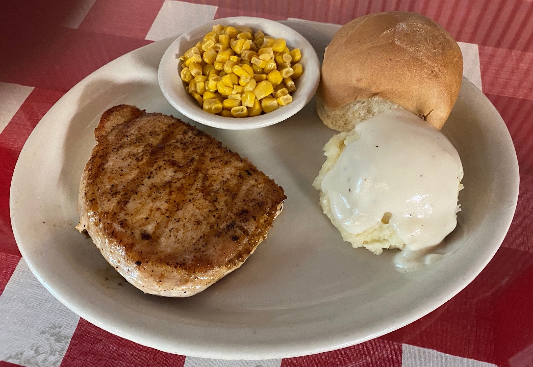 Order Boneless Pork Chop 8 oz food online from The Texan Cafe & Pie Shop store, Hutto on bringmethat.com