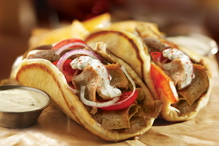 Order Lamb & Beef Gyro food online from New York Pizza & Family Restaurant store, Tannersville on bringmethat.com