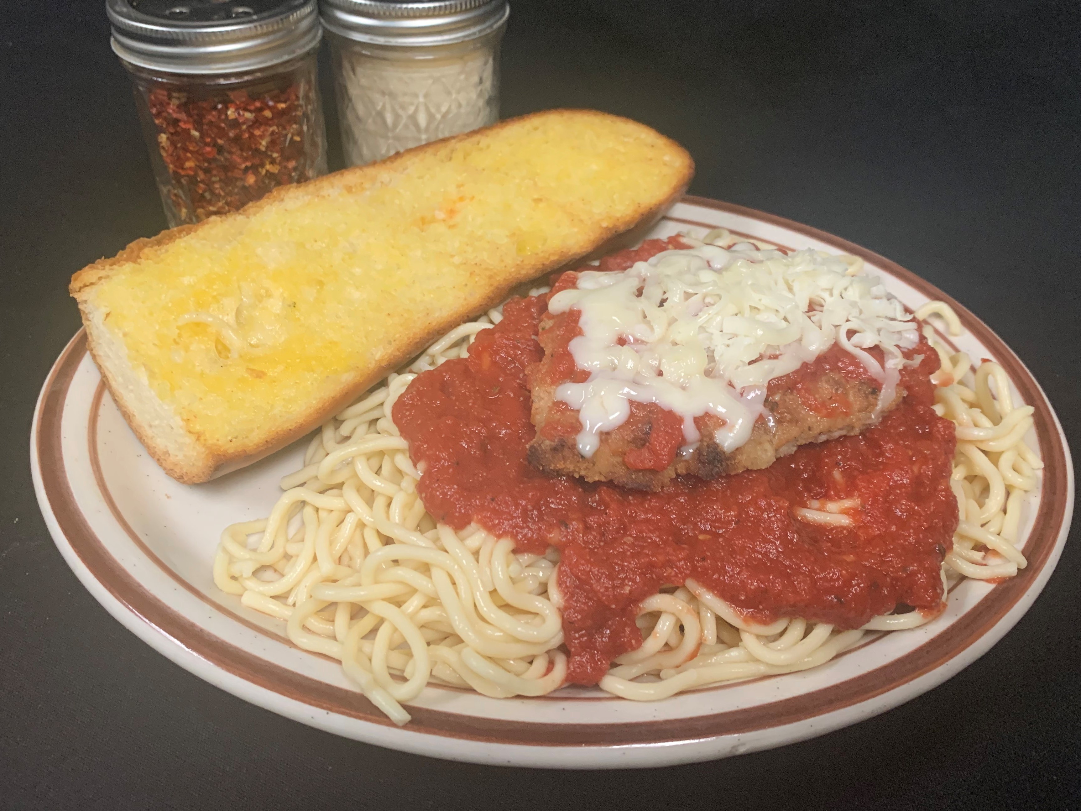 Order Spaghetti and Chicken Parmesan food online from Tony Subs & Pizza store, Inglewood on bringmethat.com