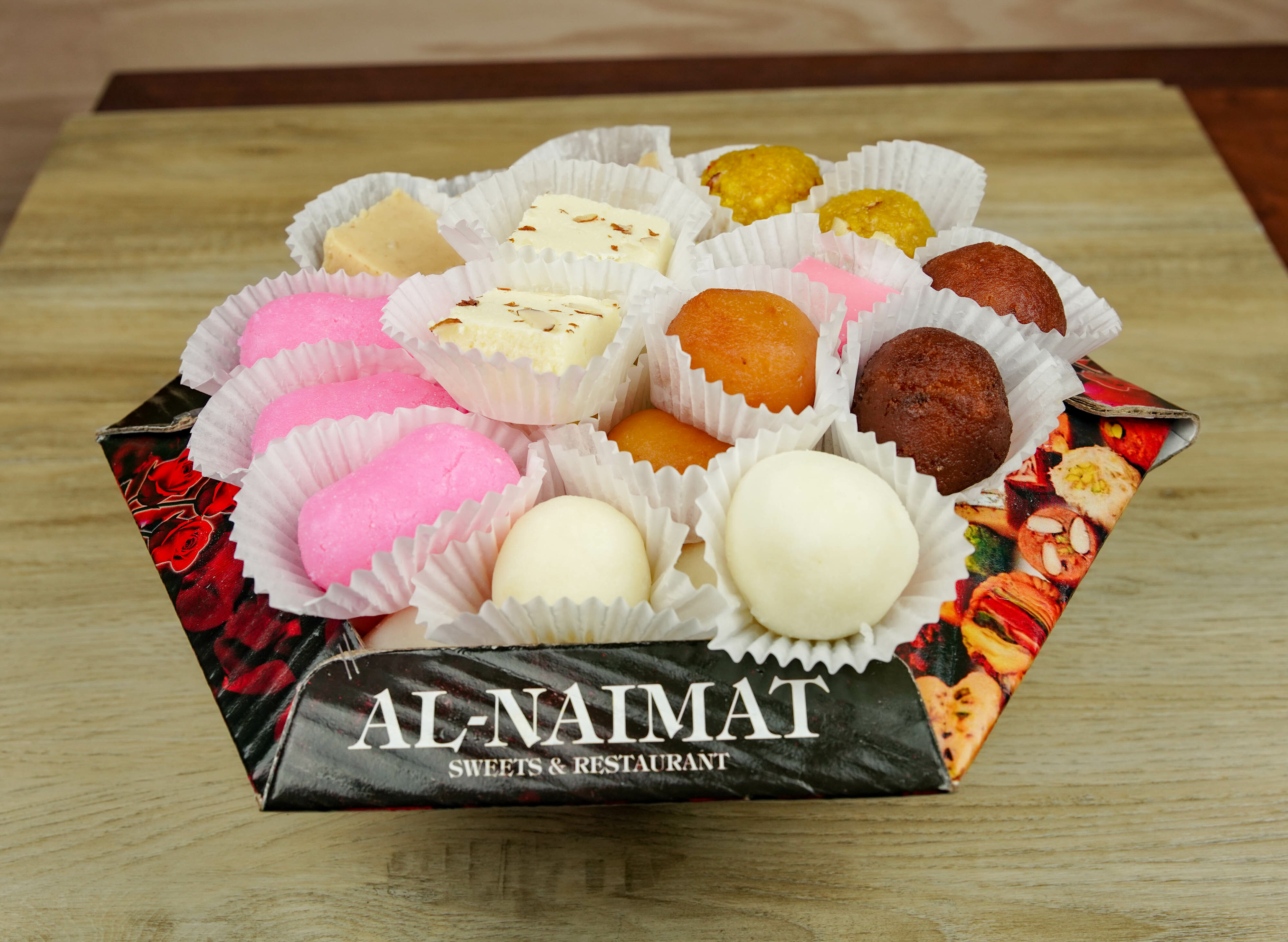 Order 2 Lb Mix Sweets food online from Phayul Restaurant store, Queens on bringmethat.com