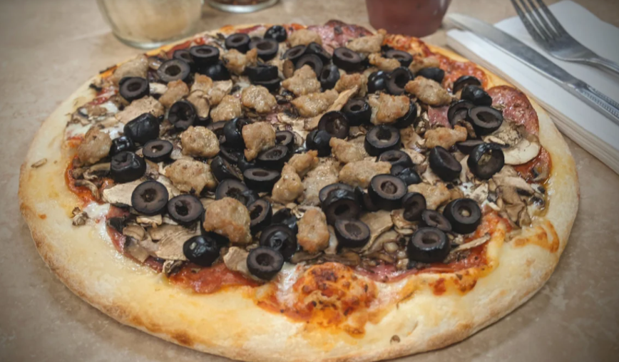 Order Crow's Nest Pizza food online from Ciro's Pizza Cafe store, Folsom on bringmethat.com