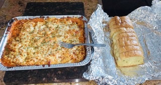 Order Lasagna food online from Simms Pizzeria store, Johnson City on bringmethat.com