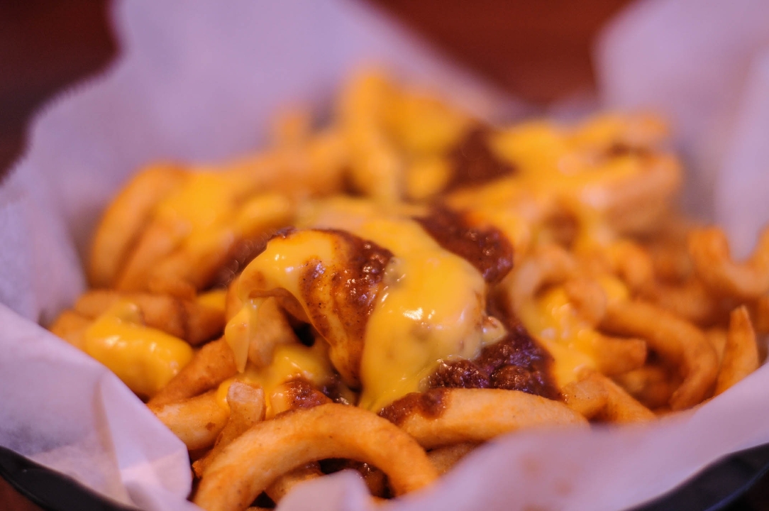 Order Curly Chilli Cheese Fries (Non Halal) food online from Slim's store, Chicago on bringmethat.com