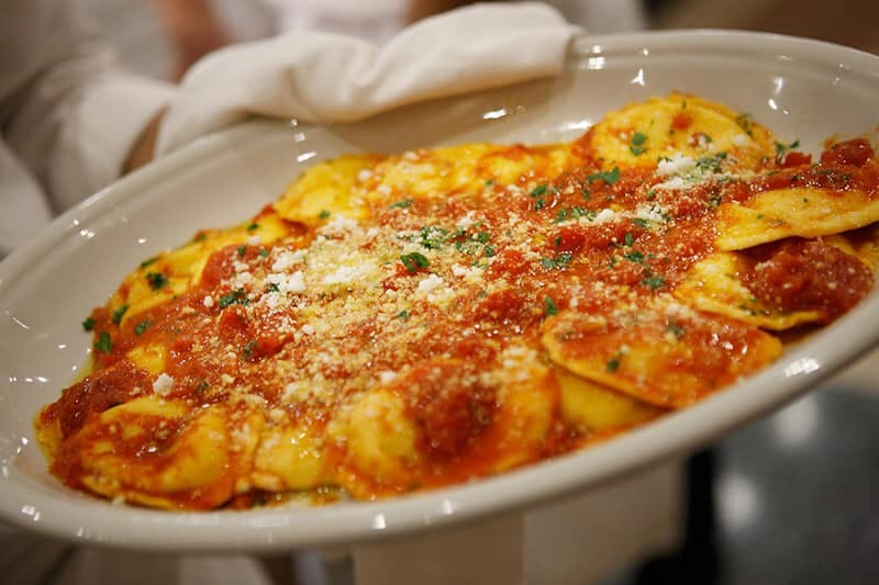 Order Baked Cheese Ravioli - Pasta food online from Italian Delite Pizzeria & Restaurant store, Trappe on bringmethat.com