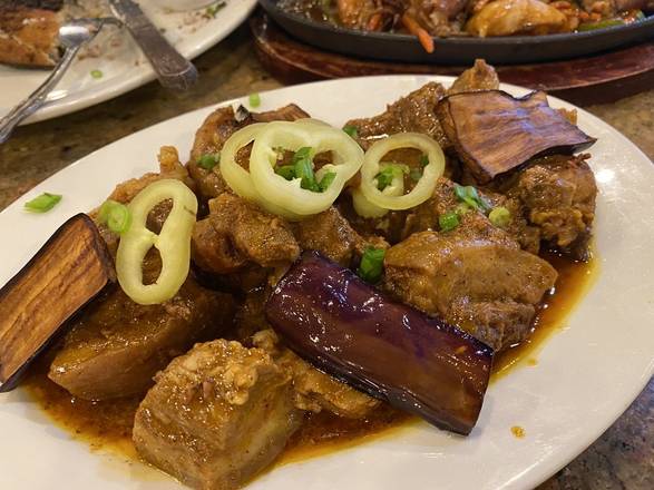 Order Pork Binagoongan food online from Tita Mia Filipino Restaurant & Cafe store, Niles on bringmethat.com