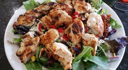 Order Sesame Asian Grilled Chicken Salad - Salad food online from Veneto Ristorante store, North Chelmsford on bringmethat.com