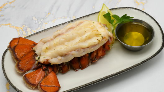 Order Lobster Tail (4 oz.) food online from McCormick & Schmick's store, Charlotte on bringmethat.com