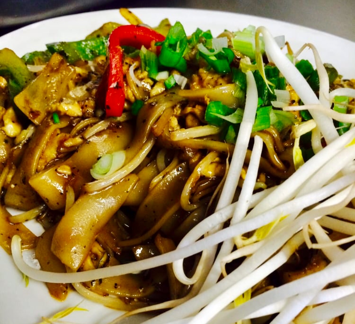 Order N5. Drunken Noodle food online from Ahan Thai Restaurant store, Royal Oak on bringmethat.com