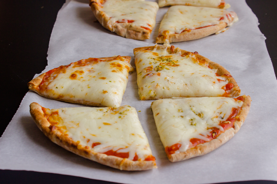 Order Four cheeses pizza food online from Gyroland store, Rockville on bringmethat.com