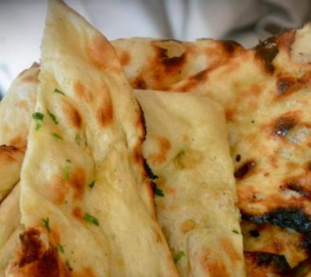 Order Plain Naan food online from House Of India store, Collegeville on bringmethat.com