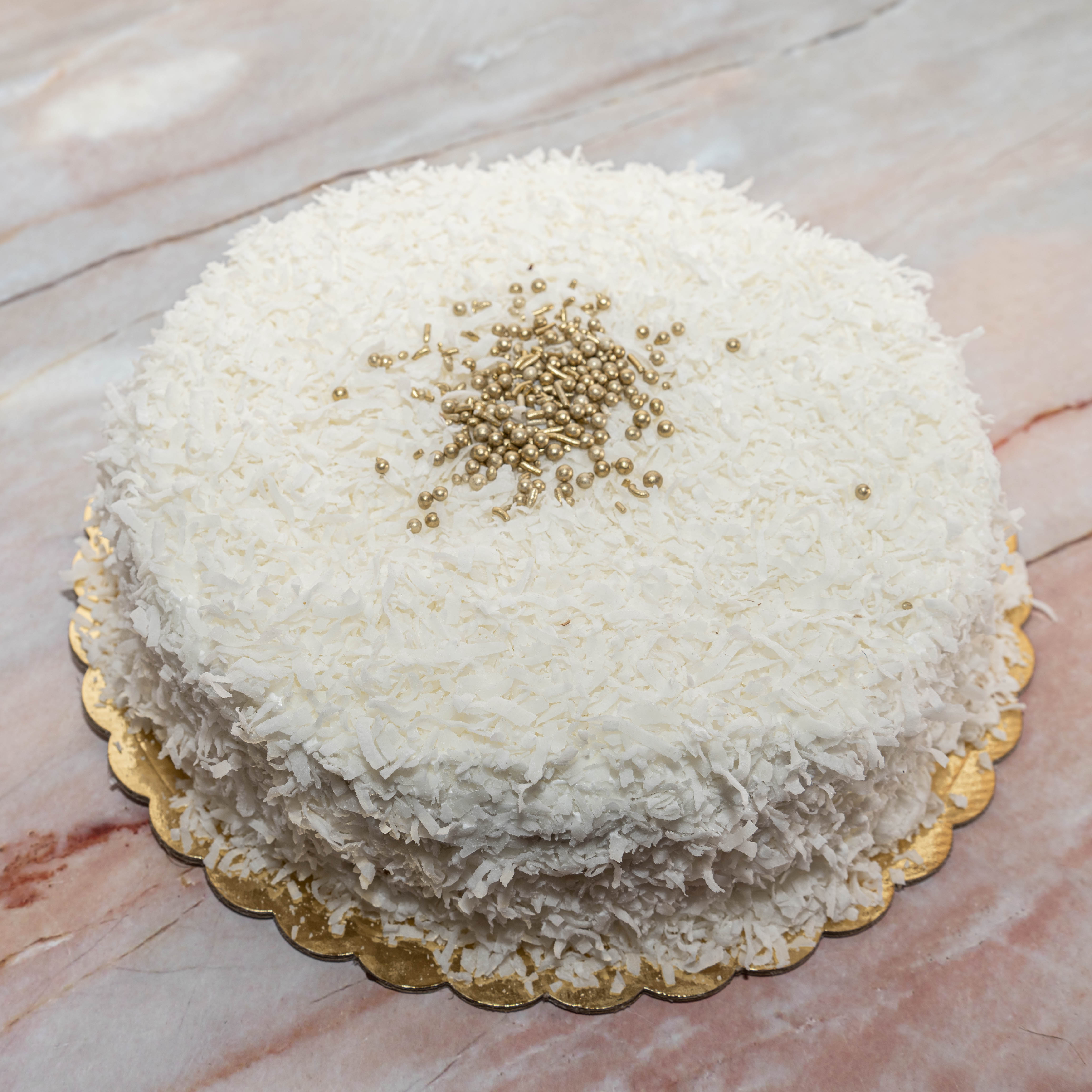 Order Raffaello Cake  food online from Teapot Bakery And Cafe store, Glendale on bringmethat.com