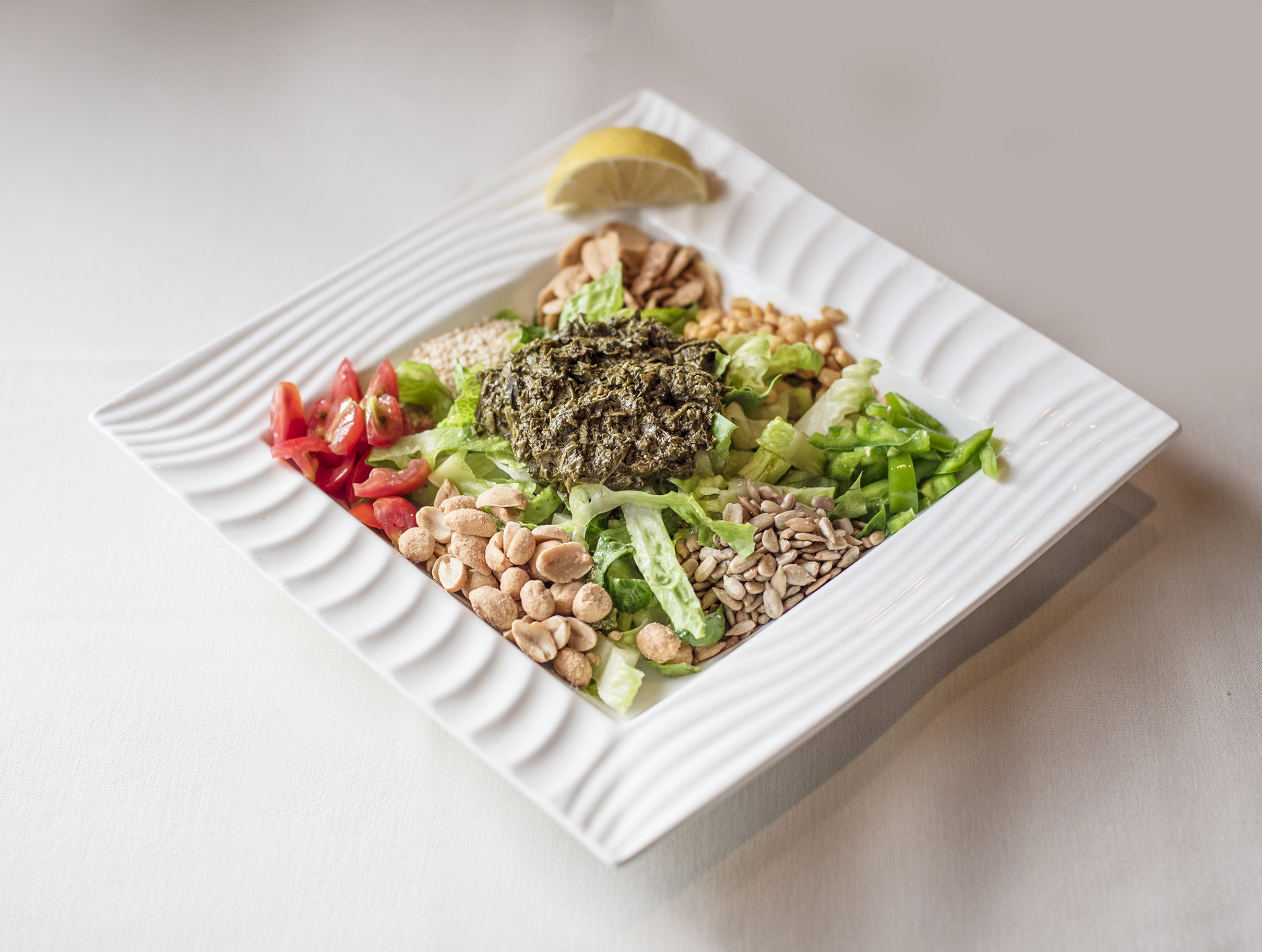 Order Tea Leaf Salad with Lettuce food online from Experience Burma Restaurant & Bar store, Pleasanton on bringmethat.com