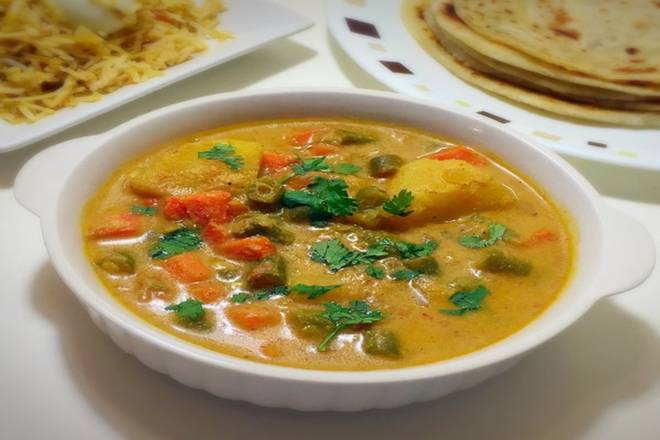 Order Parotta And Vegetable Kurma food online from Tower Indian Restaurant store, Morrisville on bringmethat.com