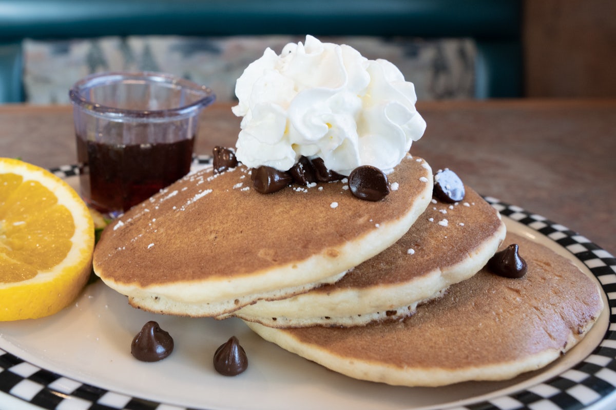 Order Cubs Chocolate Chip Pancakes food online from Black Bear Diner store, Colorado Springs on bringmethat.com