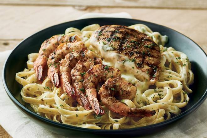 Order Queensland Chicken & Shrimp Pasta food online from Outback Steakhouse store, Albuquerque on bringmethat.com
