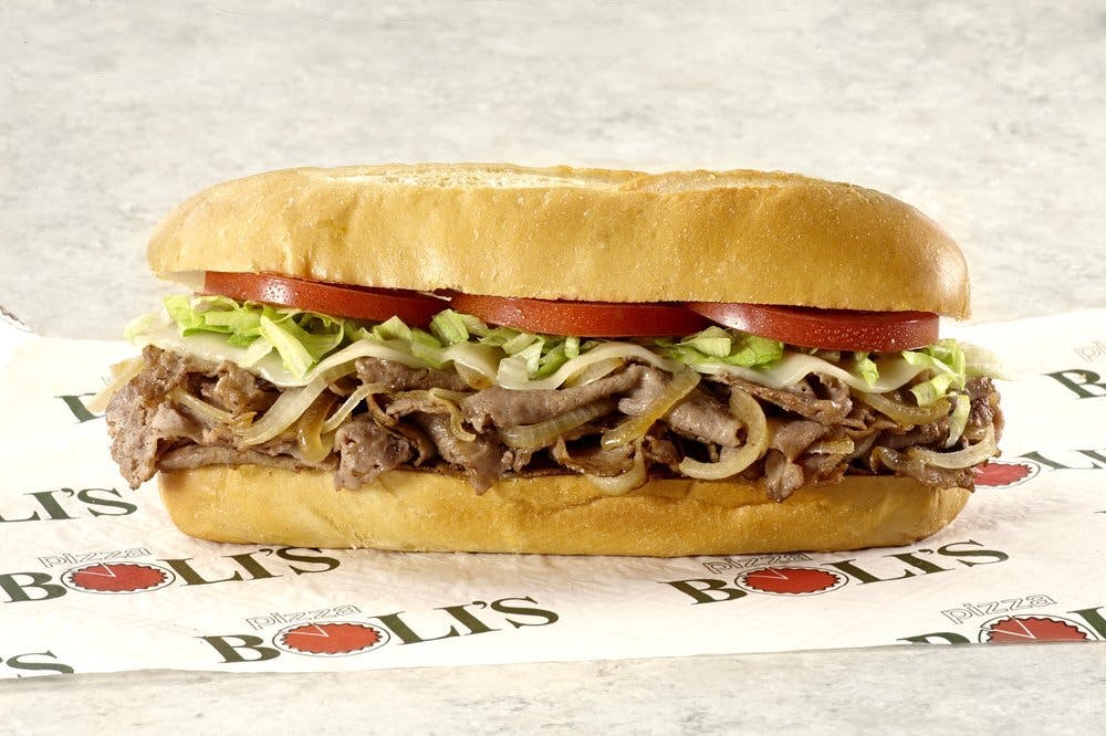 Order Philly Cheesesteak Sub - Half 8'' food online from Pizza Boli's store, Baltimore on bringmethat.com