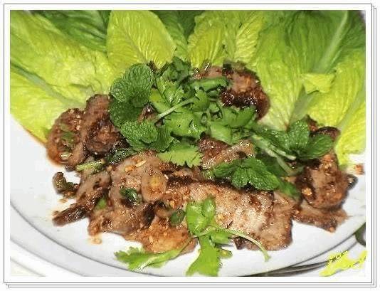 Order Grilled Pork Salad (Gluten Free) food online from Bahn Thai Restaurant store, Seattle on bringmethat.com