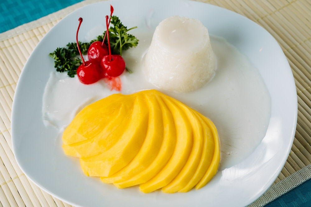 Order Mango with Sticky Rice food online from Banana Leaf Thai Restaurant store, Dallas on bringmethat.com