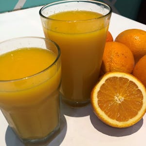 Order Orange Juice food online from Cafe 50's (west la) store, Los Angeles on bringmethat.com