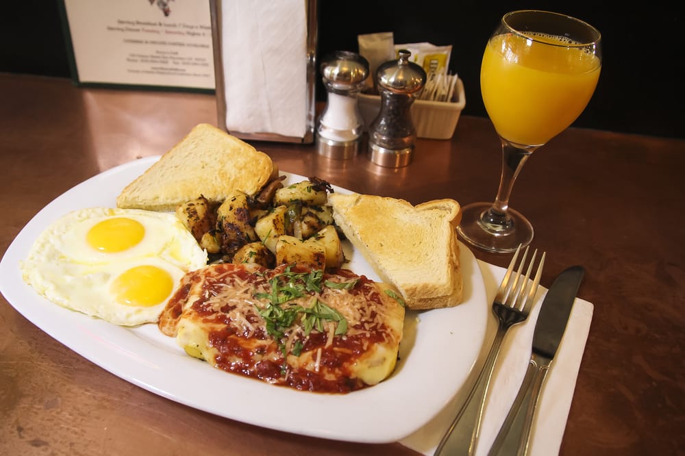 Order Grilled Homemade Polenta & Eggs food online from Rocco's Cafe store, San Francisco on bringmethat.com