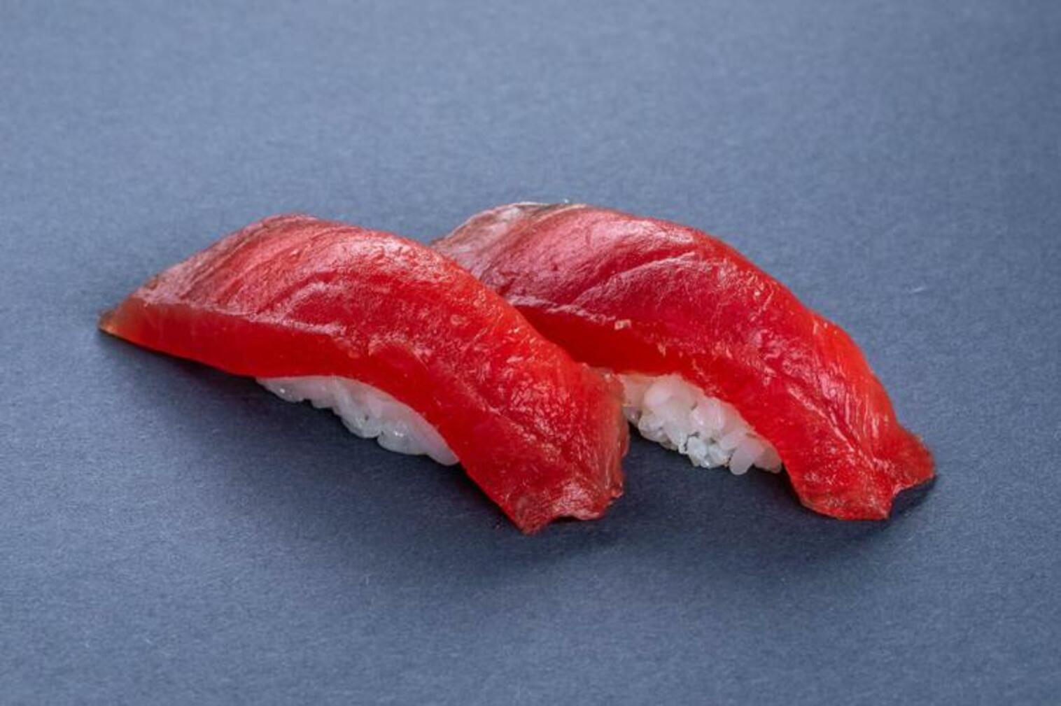 Order (b011) Tuna Sushi food online from Sushi Stop store, Los Angeles on bringmethat.com